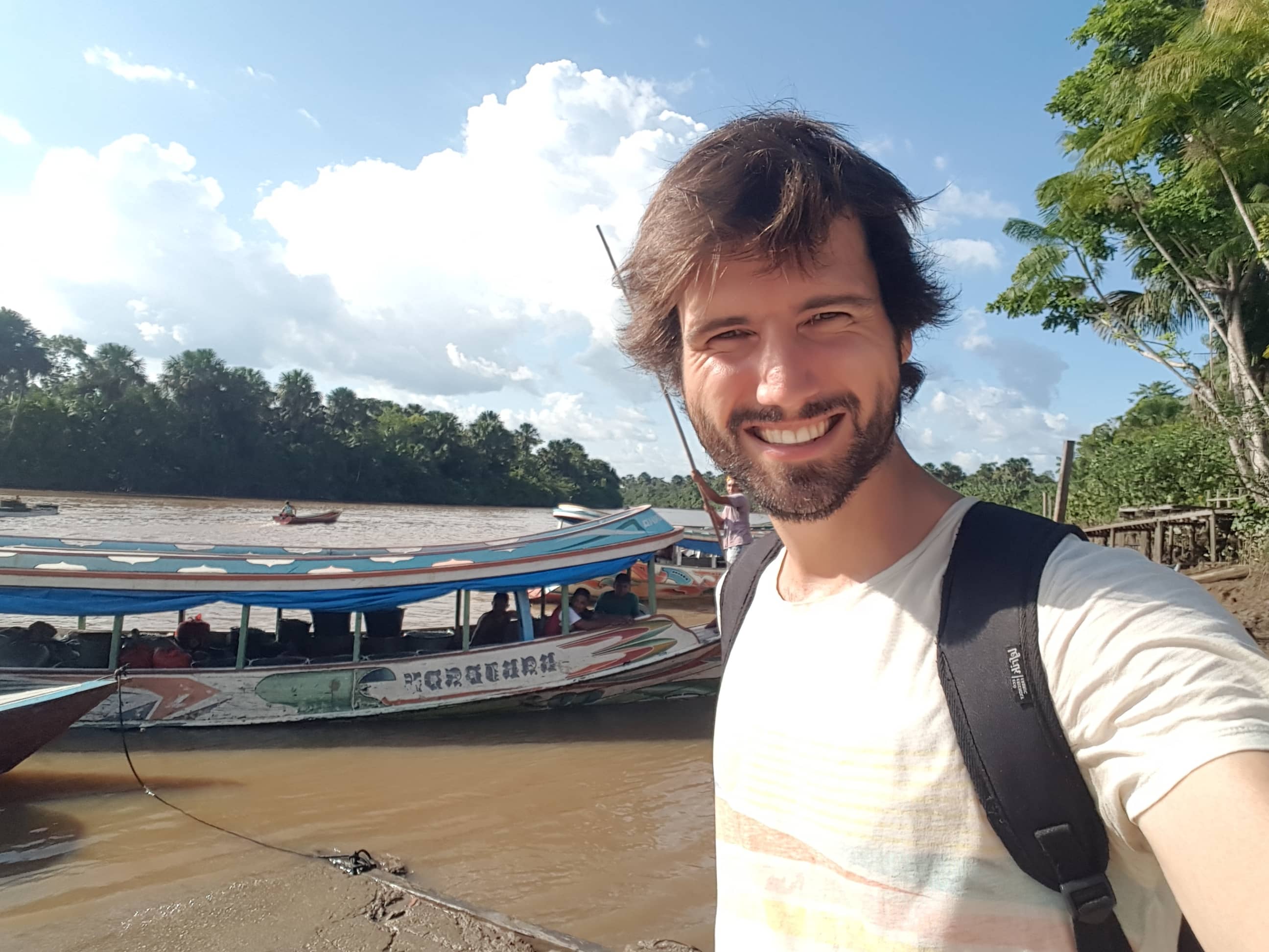 Damien in the Amazon, visiting açaí pickers in Brazil
